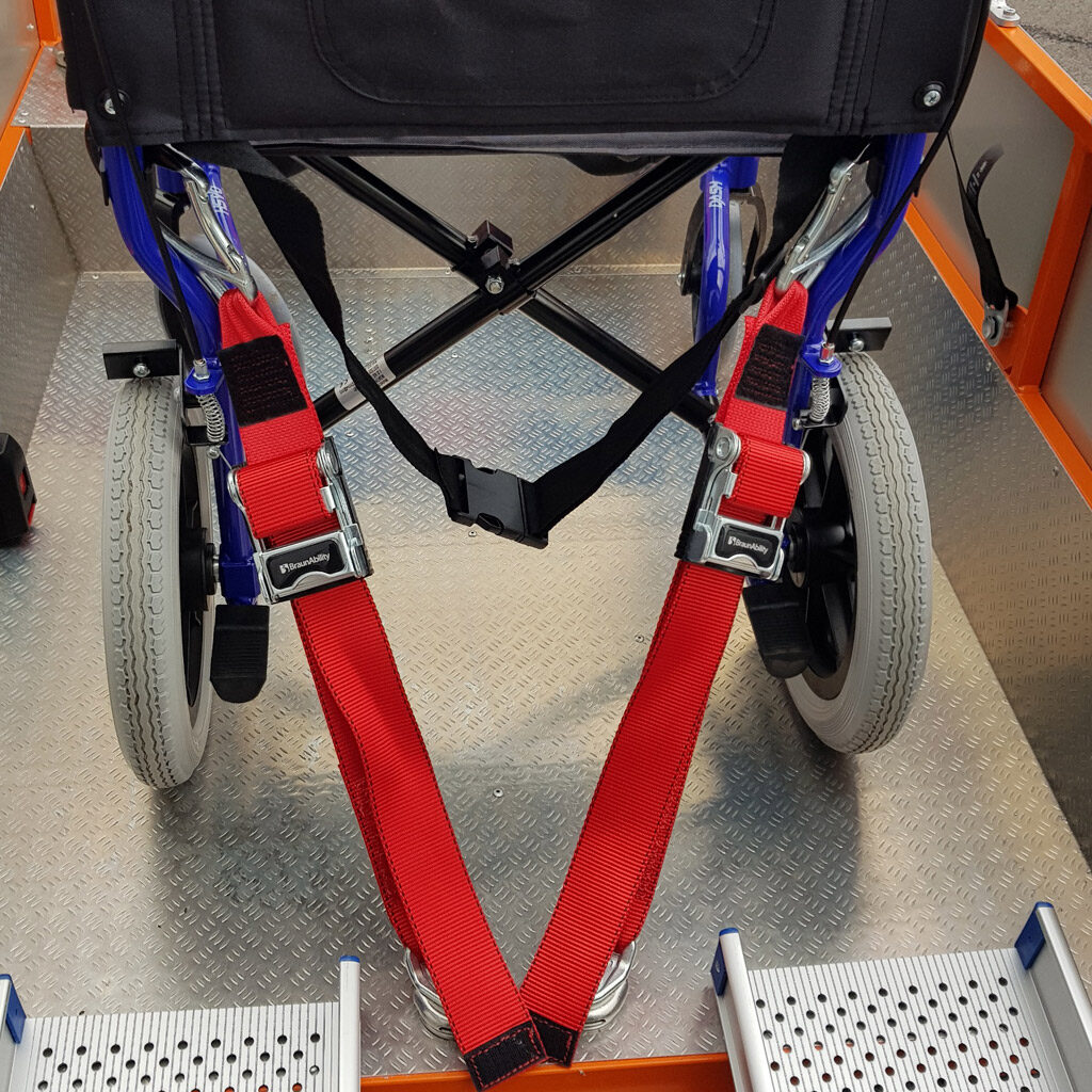 Adventure trike with wheelchair secured 
